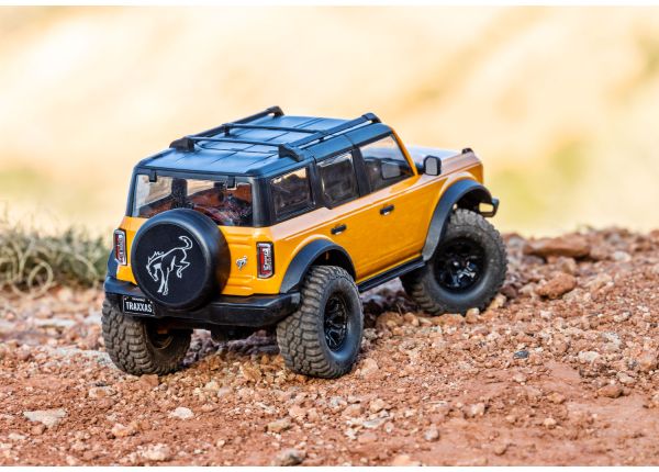 97074-1-TRX4m-Bronco-Action-Orange-rear-0957_56952528 Traxxas TRX4m Ford Bronco 1:18 Scale Trail Crawler Orng - Image 7